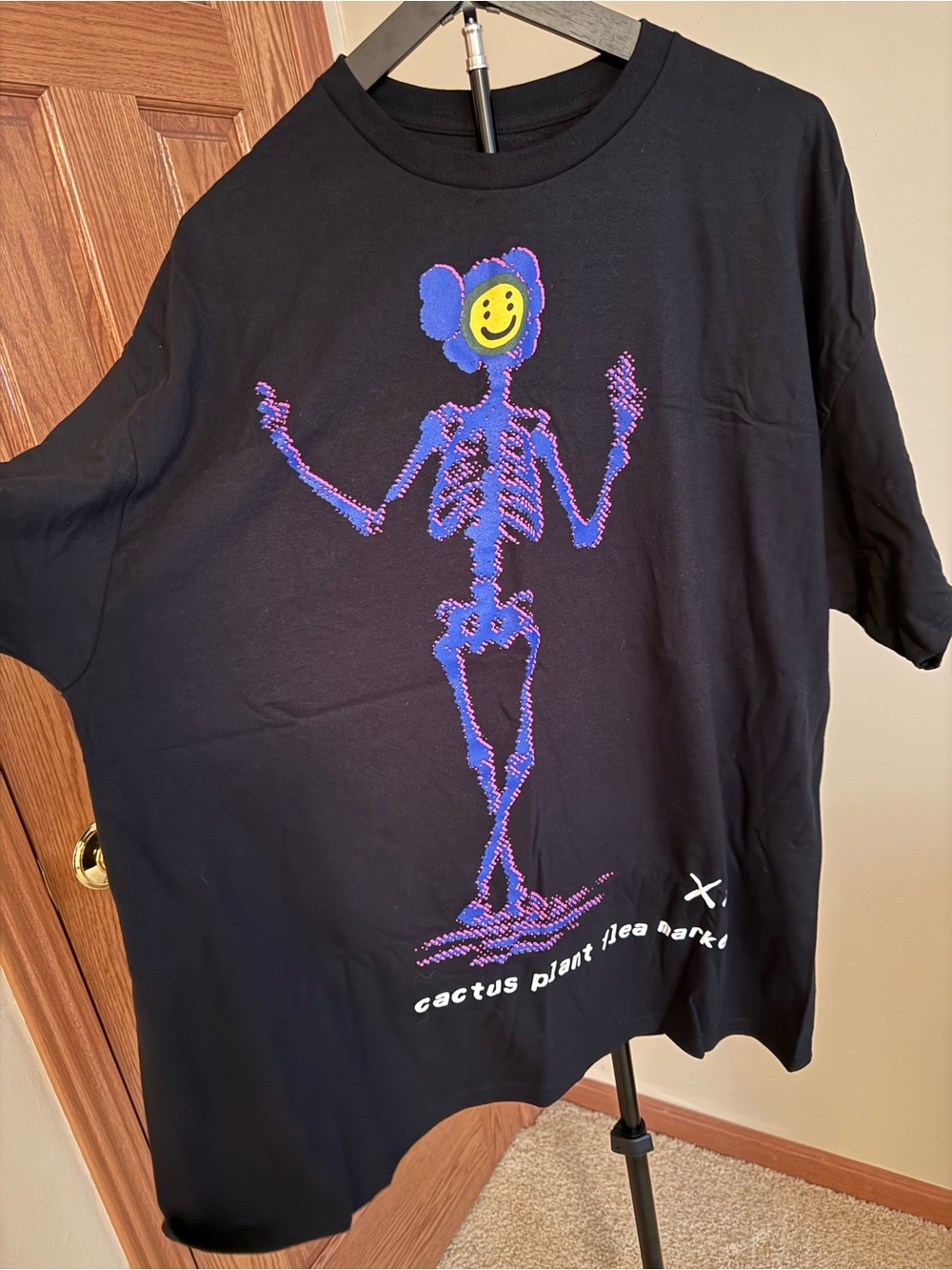 Cactus Plant Flea Market Black Tee with Purple Skeleton and Yellow Smiley Head